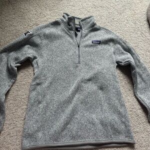 Patagonia women’s Zip-Up Sweater in Heather Gray with Big 12 logo on sleeve